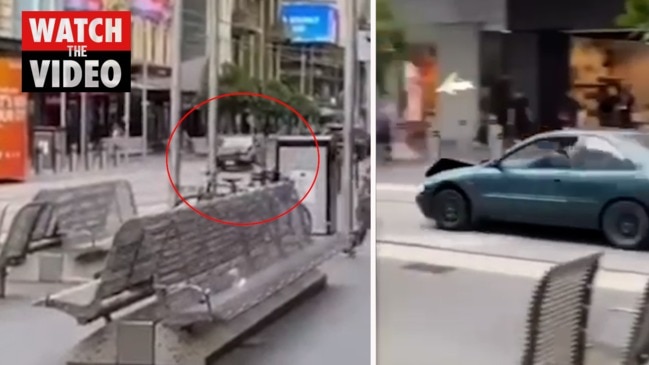 Terrifying moment car hurtles down Bourke St