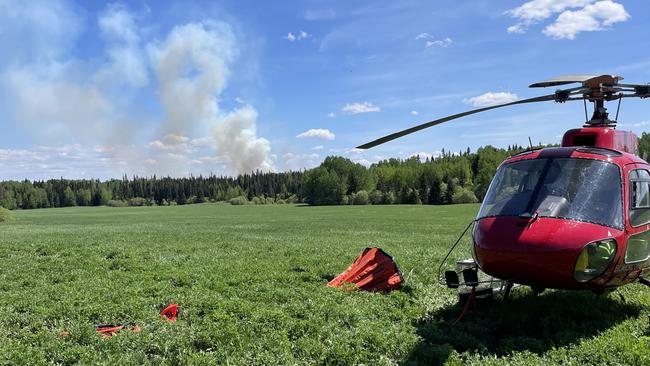 Old Beach man Carter Hansen, 25, a helicopter pilot, is flying missions in British Columbia, Canada, amid an unprecedented wildfire season. Picture: Supplied