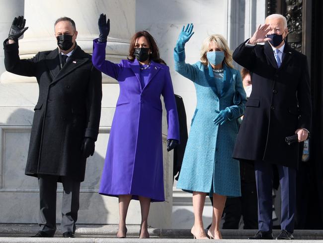 The fab four: Doug Emhoff, US Vice President-elect Kamala Harris, Jill Biden and President-elect Joe Biden wave as they arrive on the East Front of the US Capitol for the inauguration in Washington, DC. Picture: Getty Images