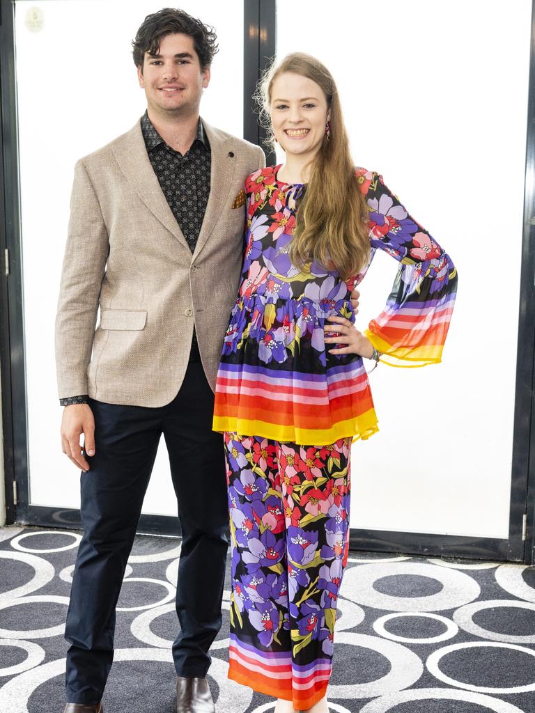 Models Josh Smith and Sophie Gull prepare for the runway for the Kaye Foley Modelling Academy and Agency show at the Melbourne Cup luncheon hosted by Rotary Club of Toowoomba City raising funds for Protea Place, Tuesday, November 1, 2022. Picture: Kevin Farmer