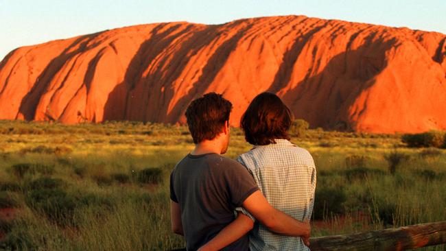 DEC 31, 1999 : Melbourne couple Cameron Wellard & Anne Walstab at Uluru (Ayers Rock), for private New Year's Eve Millennium celebration. PicMegan/Lewis. Northern/Territory Travel NT tourism generic