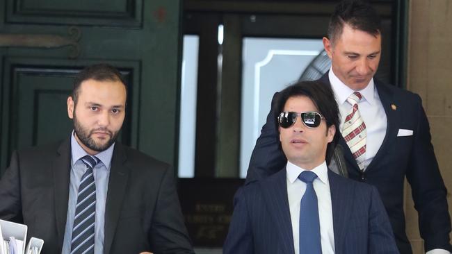 Fadi Ibrahim leaves Central Local Court with his legal team today. Picture: John Grainger