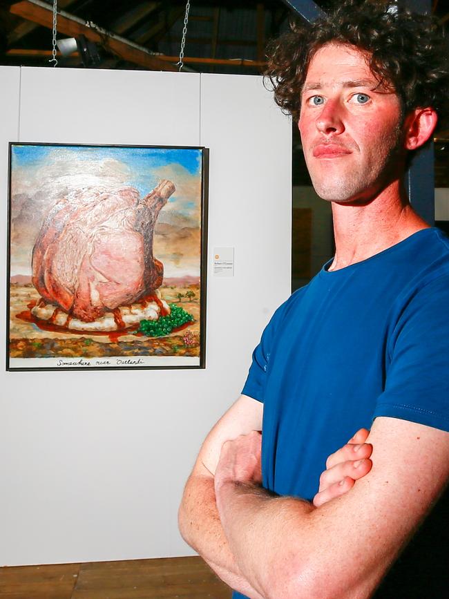 Hobart artist Robert O'Connor won the Glover Prize with his painting of a lamb dinner in a southern Tasmanian agricultural landscape. Picture: PATRICK GEE