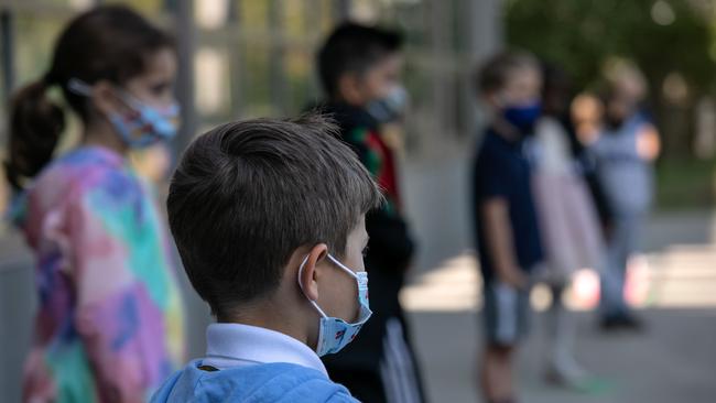 School children wait to have their portraits taken during picture day at Rogers International School in Stamford, Connecticut. Picture: AFP