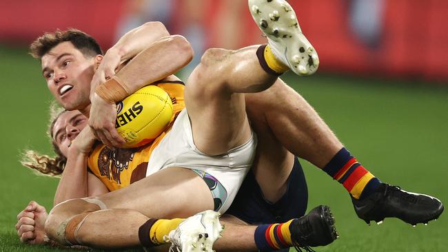 Hawk Jaeger O’Meara is tackled by Crow Sam Berry. Picture: Michael Klein