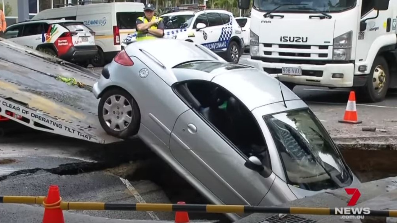 The huge hole was caused by a ruptured water main. Picture: 7 NEWS