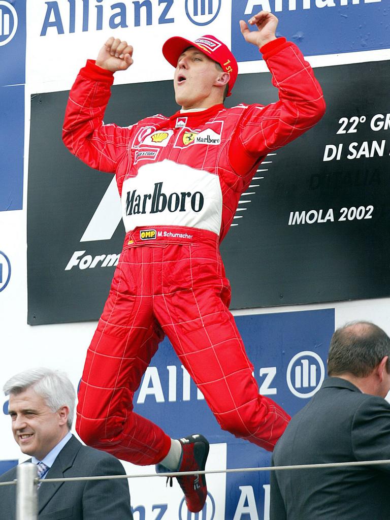 Michael Schumacher celebrating a win in San Marino in 2002.