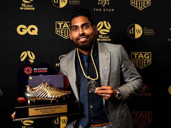 A-League Johnny Warren Medal winner and A-Leage Golden Boot winner Wellington Phoenix's Roy Krishna poses for a photograph with his awards during the Dolan Warren Awards at The Star Casino in Sydney, Monday, May 13, 2019. (AAP Image/Bianca De Marchi) NO ARCHIVING