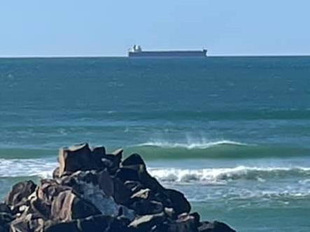 Italian container ship MBA Giovanni is listed as 'not under command' and is situated off the coast of the mid north coast town of Urunga.