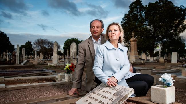 Rachel Egan, who believed she was potentially the granddaughter of the Somerton Man, with husband and University of Adelaide Professor Derek Abbott at the Somerton Man’s gravesite in West Terrace Cemetery. As it turned out, Ms Egan was not related to Carl Webb, who has now been identified as the mystery man. Picture: Matt Turner