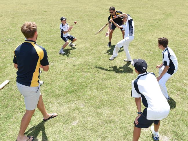 Ringwood cricketers Ian Holland and David King running a cricket clinic at Montrose Recreation Reserve in 2016. Picture: Lawrence Pinder