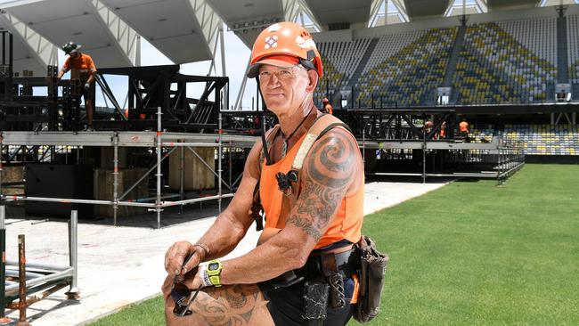 Work is underway at Queensland Country Bank Stadium with Ken Samson from Clifton Productions helping to build the Apollo stage system for this weekend's Killers concert. Picture: Shae Beplate.