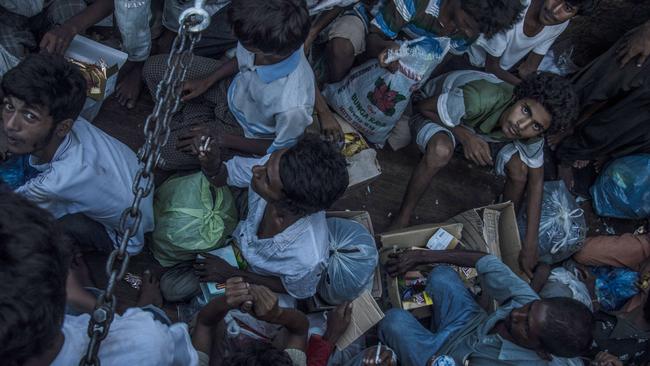 Human suffering ...  Hundreds of starving asylum seekers, including many from the stateless Muslim Rohingya ethnic minority, have been rescued off Indonesia.