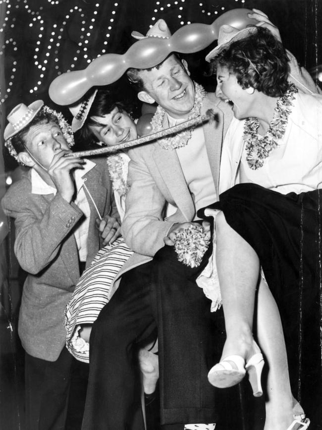 Graham Horn, Lilian Stiles, Peter Hunt and Julie Barlow welcome in 1957 at Luna Park.