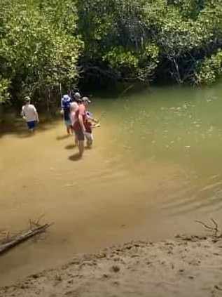 Residents warn of crocodile danger as children fish in Deep Creek. Picture: Supplied.