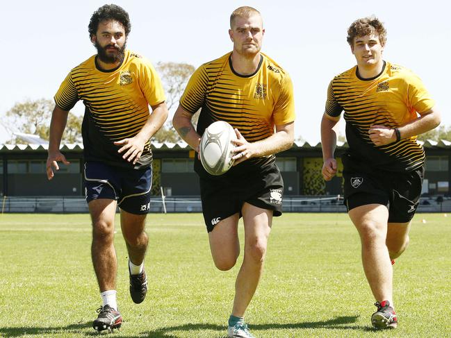 L to R: Matthew Gaitao, Club Captain Edward Mackey and Sam Hunt. Members of the UNSW Rugby in training in daceyville. UNSW Rugby are looking to recruit new players. Picture: John Appleyard