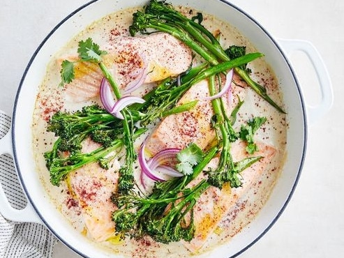 Creamy tahini salmon tray bake.