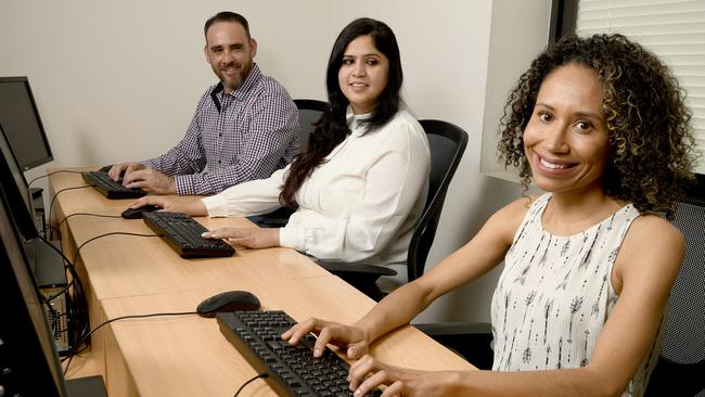 US tech giant MTX Group will open 150 training places as part of a plan to create 500 jobs at a new service hub in Adelaide. Students Guy Everingham, Khushboo Singh and Roseli Jardim are pictured in its training facility on Leigh Street in September. Picture: Naomi Jellicoe