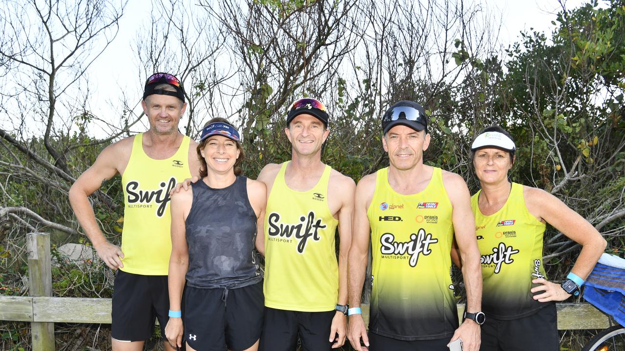 Locals Dave Fleming, Julie Teague, Jason Culton, Darren Adams and Collette Adams come together before the Yamba Triathlon Fun Run