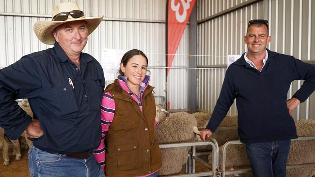 Lal Lal Mawollock managers Andrew and Ann Welsh, who bought 31 rams, with Willera Poll Merinos stud operations manager Simon Coutts.