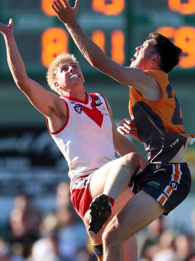 Ararat’s Cody Lindsay and Southern Mallee Giants Kieran Delahunty do battle in the ruck. Picture: Yuri Kouzmin