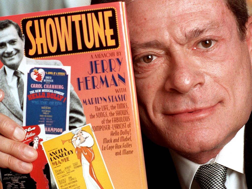 Composer Jerry Herman with his autobiography. He has died, aged 88. Picture: AP Photo/Jim Cooper