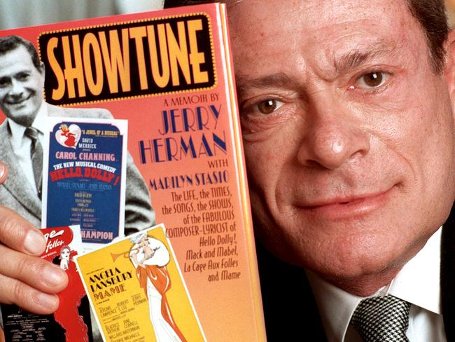 Composer Jerry Herman with his autobiography. He has died, aged 88. Picture: AP Photo/Jim Cooper