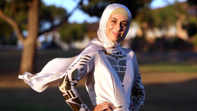 Australian designer Ilham A. Ismail, in Sydney yesterday with one of her outfits, welcomes DFAT’s support for the industry. Picture: James Croucher