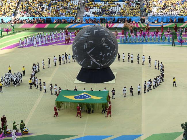 Performers take part in the opening ceremony of the 2014 FIFA World Cup in Sao Paulo, prior to the opening match.