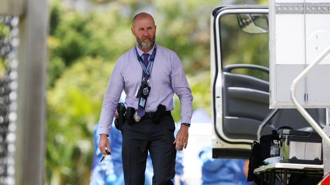 Police at the scene after the murder. Picture: NIGEL HALLETT