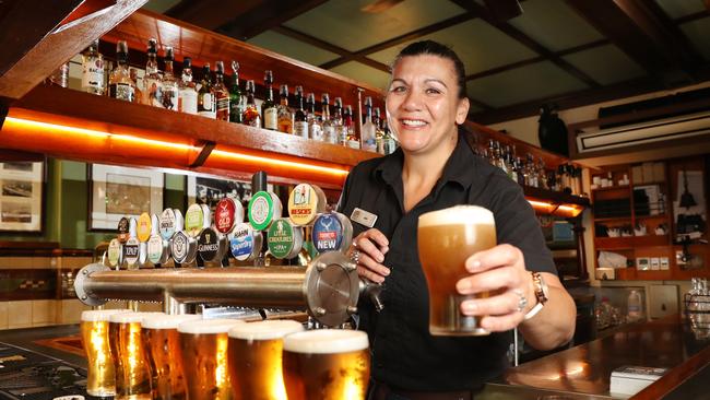 Pictured at The Fortune of War pub at The Rocks is bartender Jen Rounds. Thousands of kegs of beer had to be tipped out early in the Covid-19 pandemic. Picture: Richard Dobson