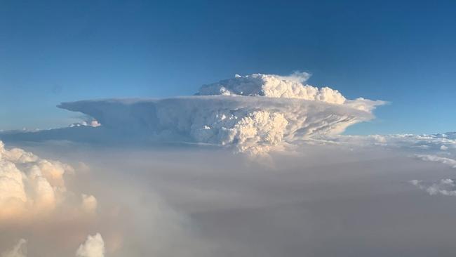 A pyrocumulonimbus cloud formation seen from a plane as bushfires continued in New South Wales, Australia, on Jan. 4. PHOTO: Aidan Morrison Twitter @quixotic/Reuters