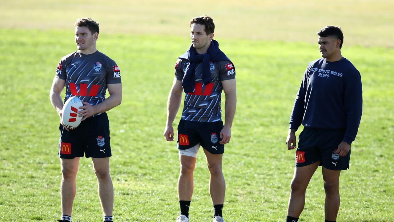 SYDNEY, AUSTRALIA - JUNE 14: (L-R) Liam Martin, Cameron Murray and Latrell Mitchell of the Blues look on during a New South Wales Blues State of Origin training session at Coogee Oval on June 14, 2023 in Sydney, Australia. (Photo by Jason McCawley/Getty Images)