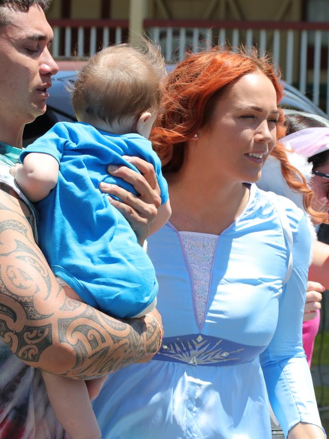 Luna's parents Jessica Feeney and Timi Matenga follow the coffin in.. Picture Glenn Hampson