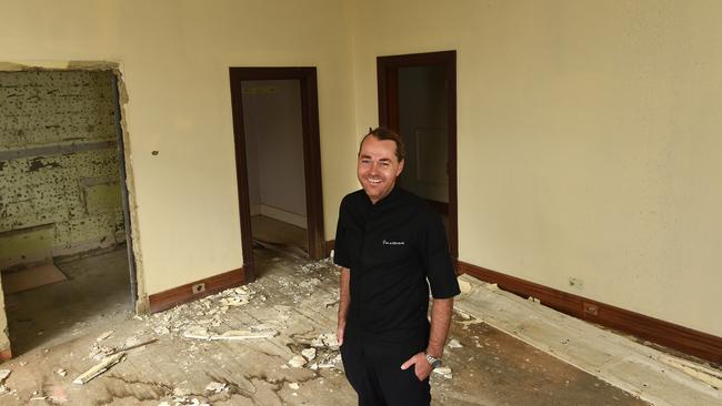 Shannon Bennett inside the art deco Norris building, which has fallen into disrepair. Picture: David Smith