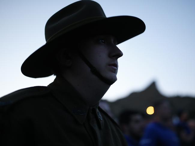 People watch the Dawn Service ceremony at the Anzac Cove beach. Picture: AP Photo/Emrah Gurel