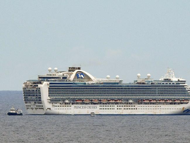 The Princess Cruises owned Ruby Princess cruise ship in waters off Sydney, Monday, March 30, 2020. A shutdown of non-essential services is in effect Australia wide in a bid to slow the spread of the coronavirus (COVID-19) disease. (AAP Image/Joel Carrett) NO ARCHIVING