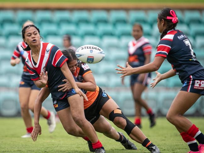 Talea Tonga gets a pass out the side. Picture: Julian Andrews