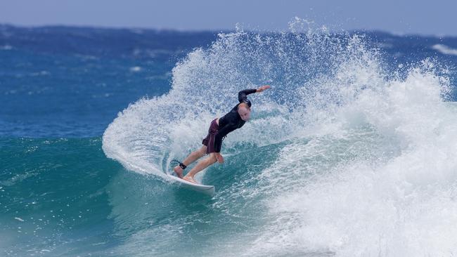 Surfers enjoying the larger swell at Snapper Rocks on Sunday 2 January 2022. Picture: Jerad Williams