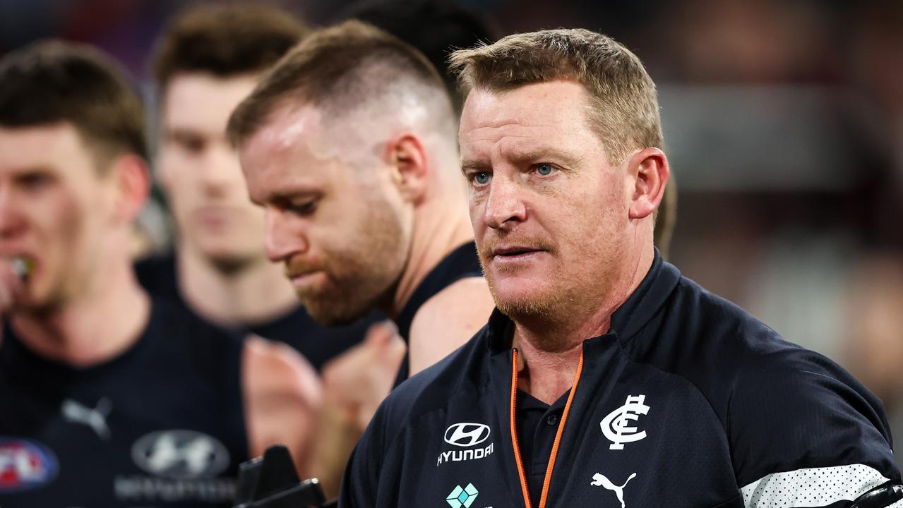 MELBOURNE, AUSTRALIA - JUNE 11: Michael Voss, Senior Coach of the Blues addresses his players during the 2023 AFL Round 13 match between the Carlton Blues and the Essendon Bombers at the Melbourne Cricket Ground on June 11, 2023 in Melbourne, Australia. (Photo by Dylan Burns/AFL Photos via Getty Images)