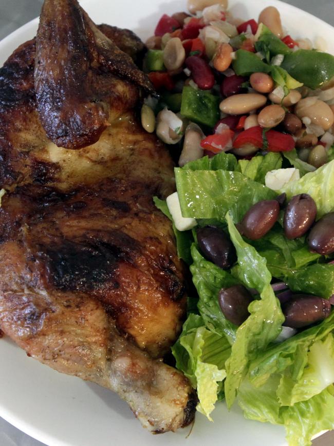 The rotisserie chicken with salads.