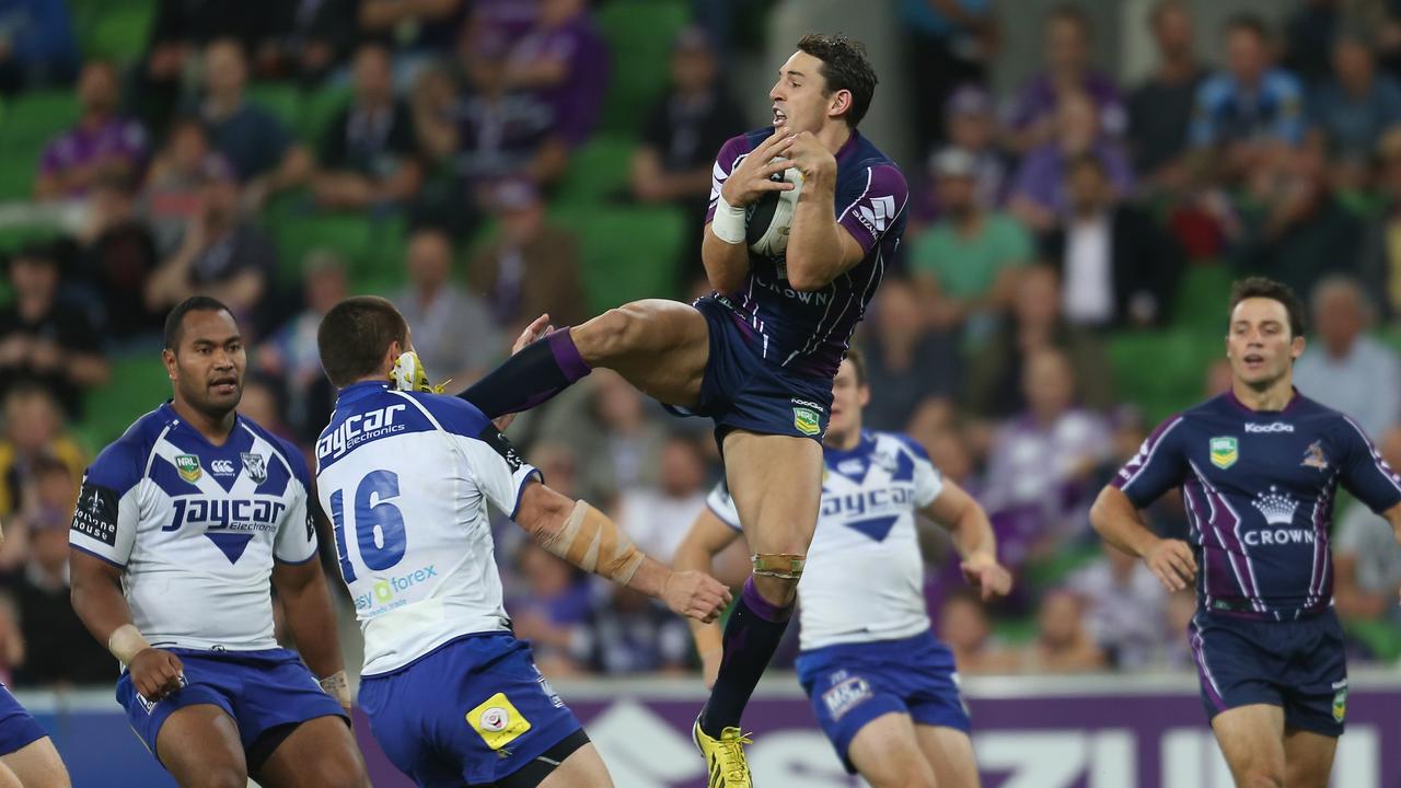 Billy Slater kicks David Klemmer of the Bulldogs in the head during the round three NRL match between the Melbourne Storm and the Canterbury Bulldogs on March 21, 2013 in Melbourne, Australia. (Photo by Scott Barbour/Getty Images)