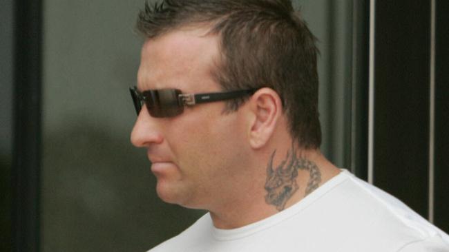 Bikie Shane Bowden walks into Southport Courthouse.