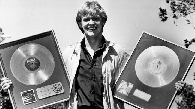 John Farnham with plaques for his work with LRB and the Uncovered album in 1982.