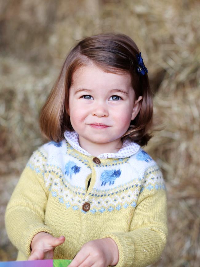 Princess Charlotte wore a pretty yellow cardigan from John Lewis for her second birthday portrait. Picture: Getty