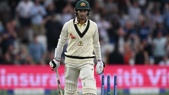 Alex Carey leaves the field after being bowled by Woakes. Picture: AFP Images