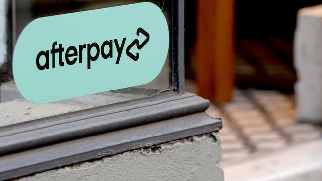 An Afterpay logo in a shop window on Little Collins Street, Melbourne. Picture: NCA NewsWire / Andrew Henshaw