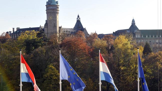This file picture shows European flags in central Luxembourg on October 23, 2008. Luxembourg was under fire on November 6, 2014 after leaked documents revealed its huge tax avoidance deals with hundreds of top global firms, putting its former premier Jean-Claude Juncker under the spotlight in his first week as EU commission chief. AFP PHOTO / DOMINIQUE FAGET