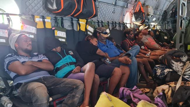 Residents from the Kalkarindji area on-board a Royal Australian Air Force C-27J Spartan as they are evacuated during major flooding in the Northern Territory.