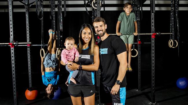 Rewired Fitness owners Alex and Sofia Houldsworth with their children Ayla, Benjamin, 9, and William, 10. Picture: Jerad Williams